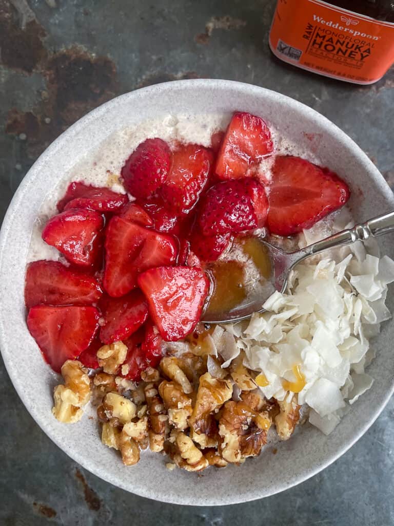 5 minute warm quinoa cereal with sautéed strawberries.