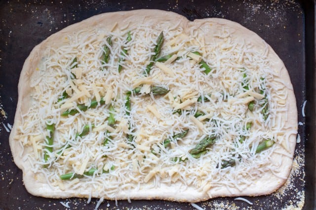 Adding the mozzarella to the dough