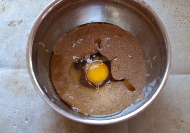 Almond butter brownie batter with egg