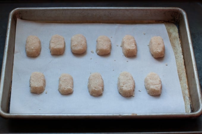 Almond joy molds on a baking sheet