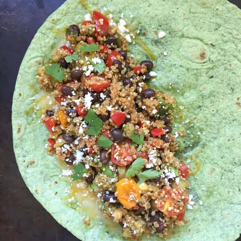 assembling the Mexican quinoa wraps