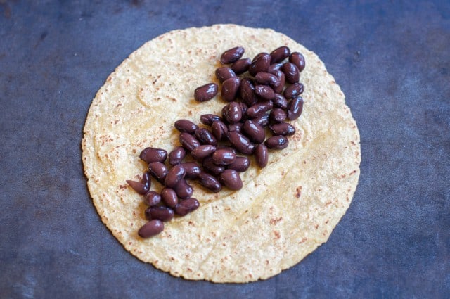 Black beans on tortilla