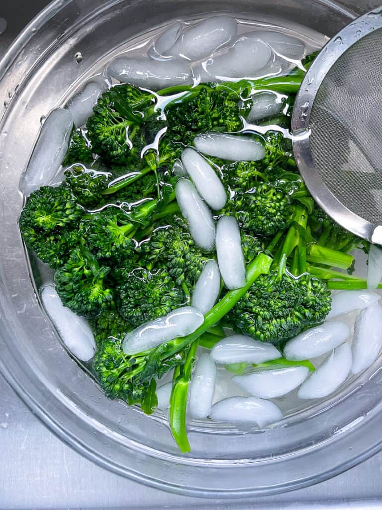 broccolini in an ice bath.