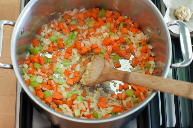 Carrots, onion and celery in pot