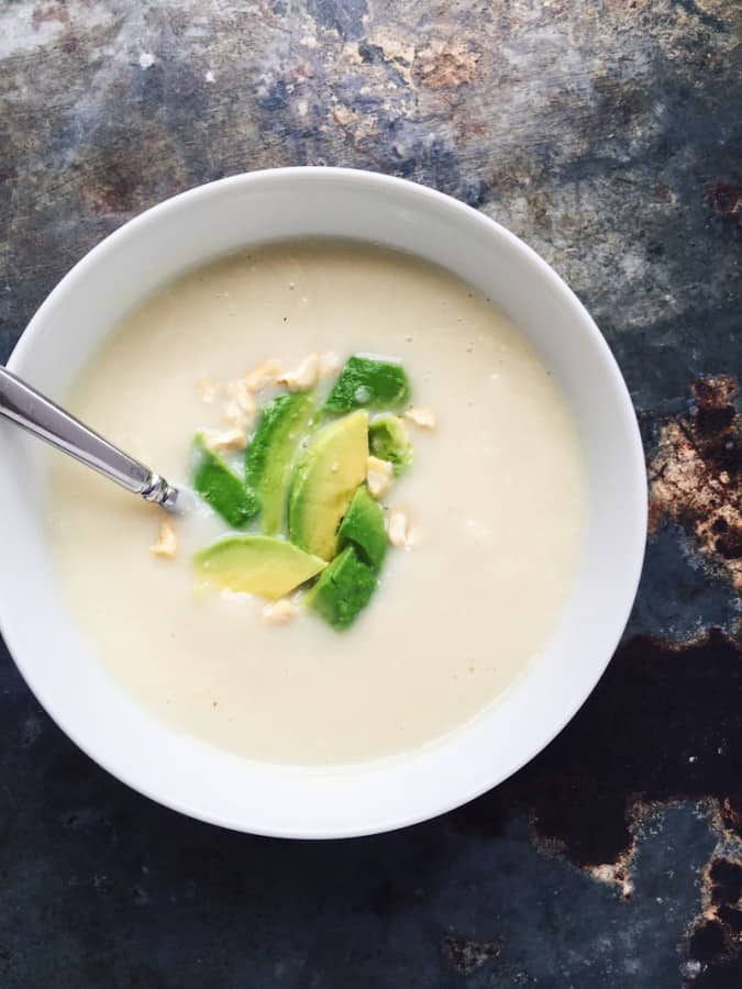 Cauliflower soup with avocado and cashews