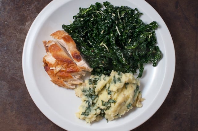Chicken, kale and mashed potatoes on plate