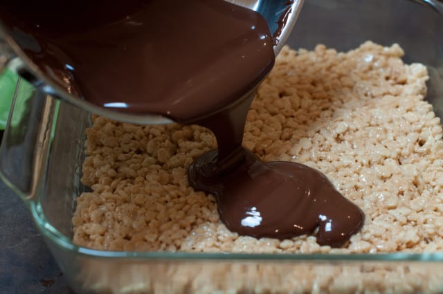 Chocolate poured over the rice crisps