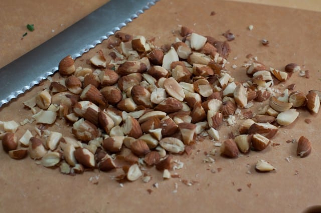 Coarsely chopping almonds
