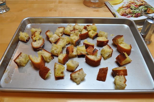 Bread cubes on pan