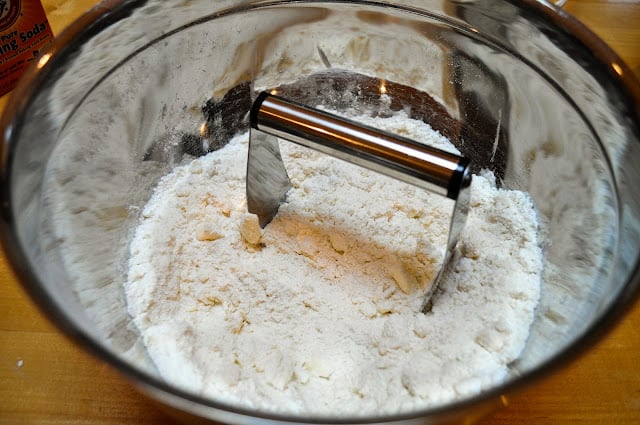 Cutting in butter to flour