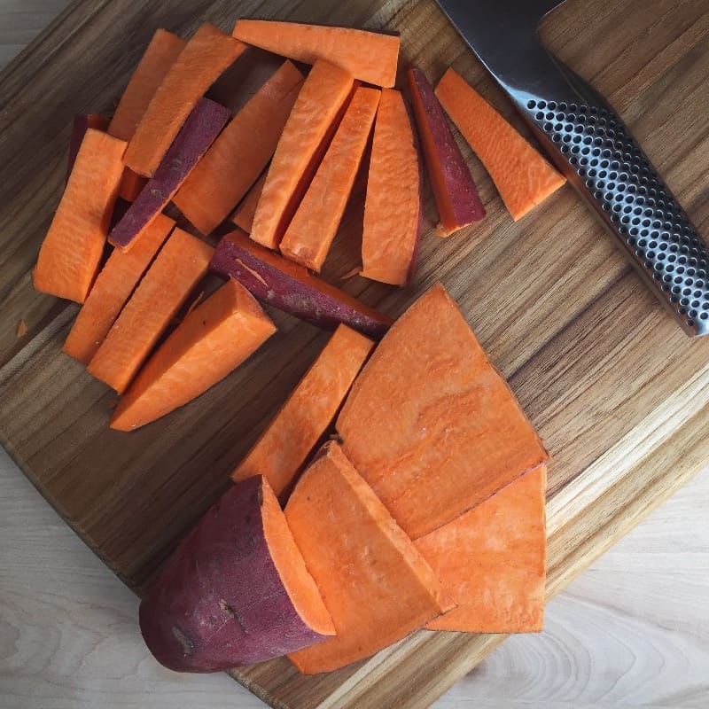 Cutting the sweet potato into fries