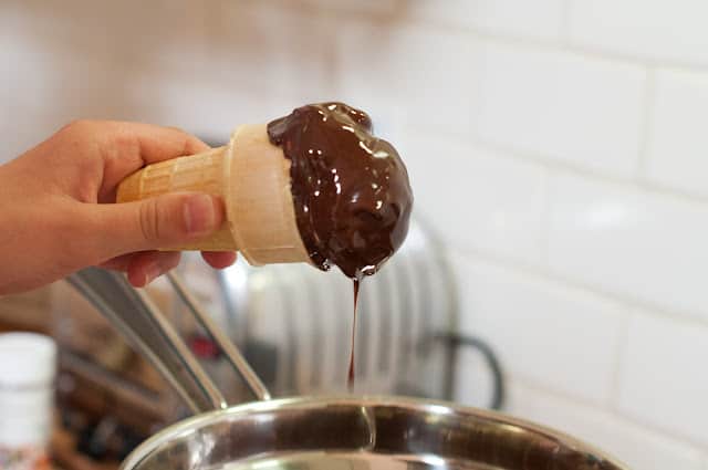 Dripping chocolate off ice cream cone