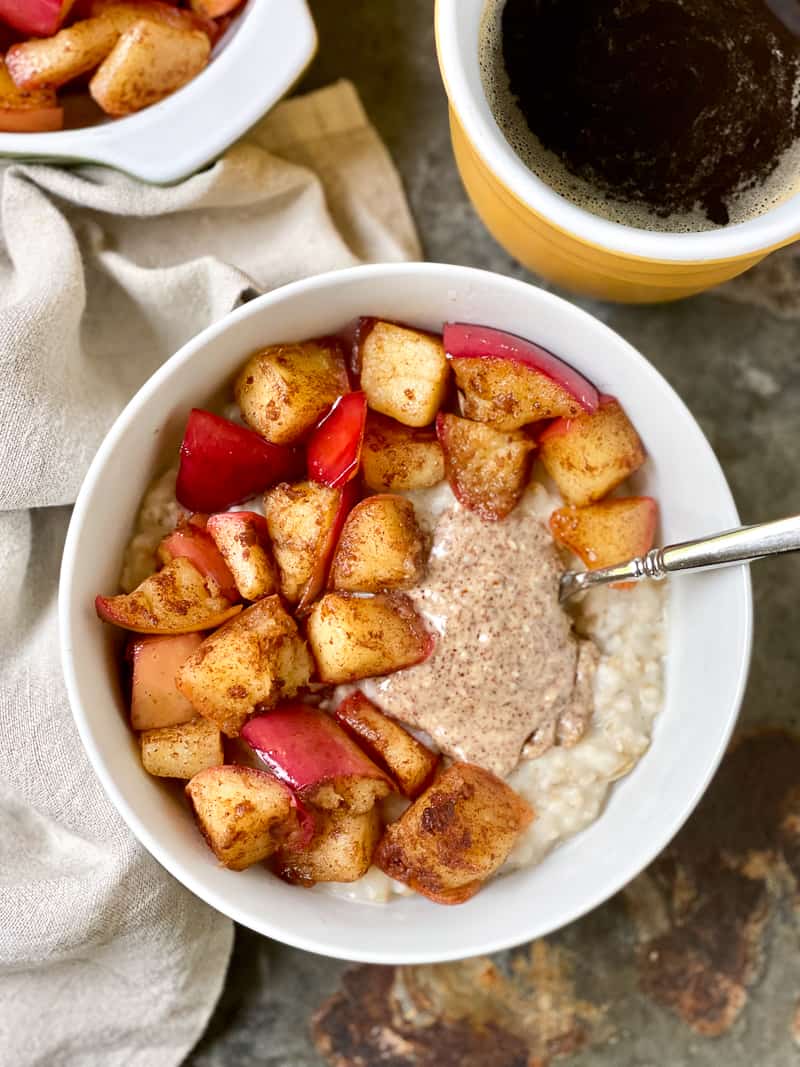 Cinnamon apples in a bowl of oatmeal