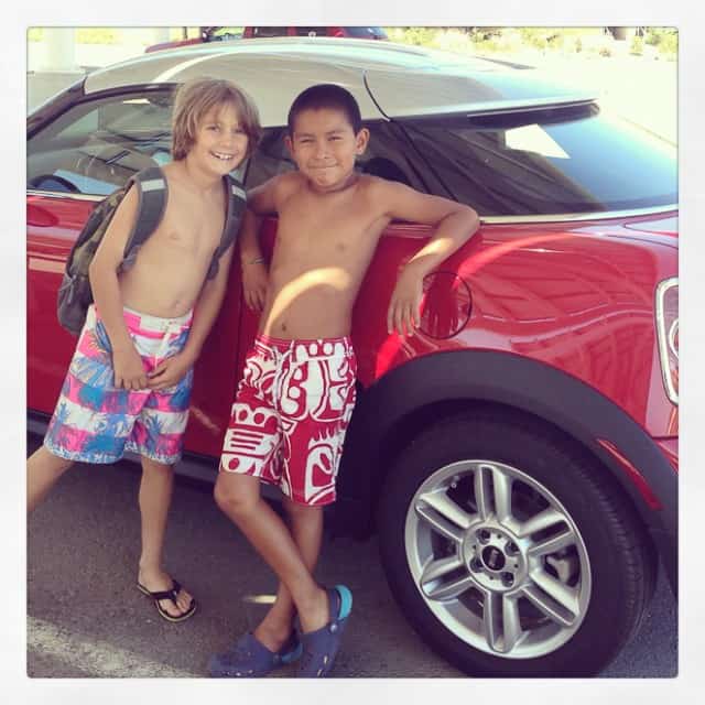 Eli and his friend with a cool car