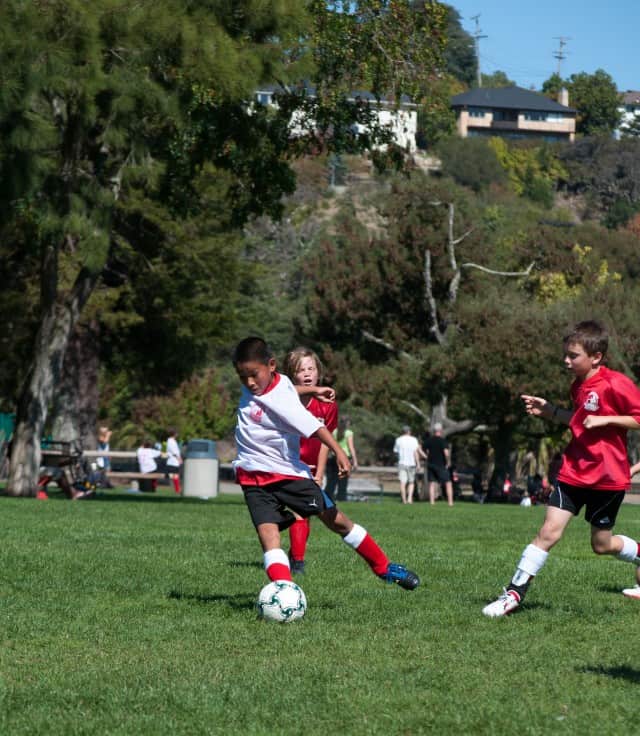 Eli in action playing soccer