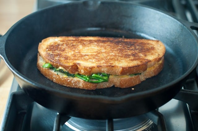 Grilled cheese in a cast iron skillet with brown top