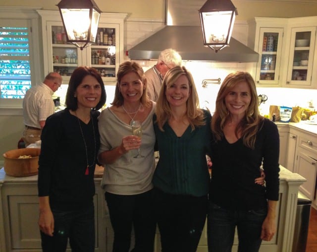 Jackie and her friends gathering in kitchen