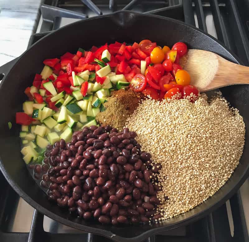 Ingredients for Mexican quinoa in the skillet