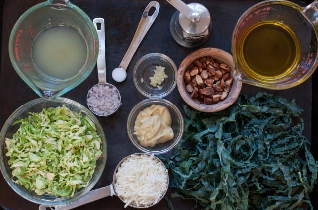 Ingredients for kale salad with Brussels sprouts and toasted almonds
