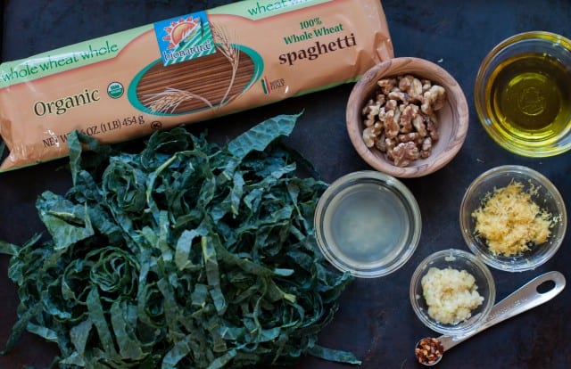 Ingredients for whole wheat spaghetti with kale lemon and toasted walnuts