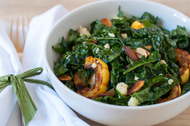 Kale salad with delicata squash , almonds and aged cheddar