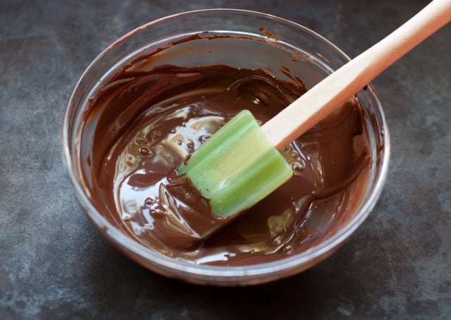 Melted chocolate with a green spatula