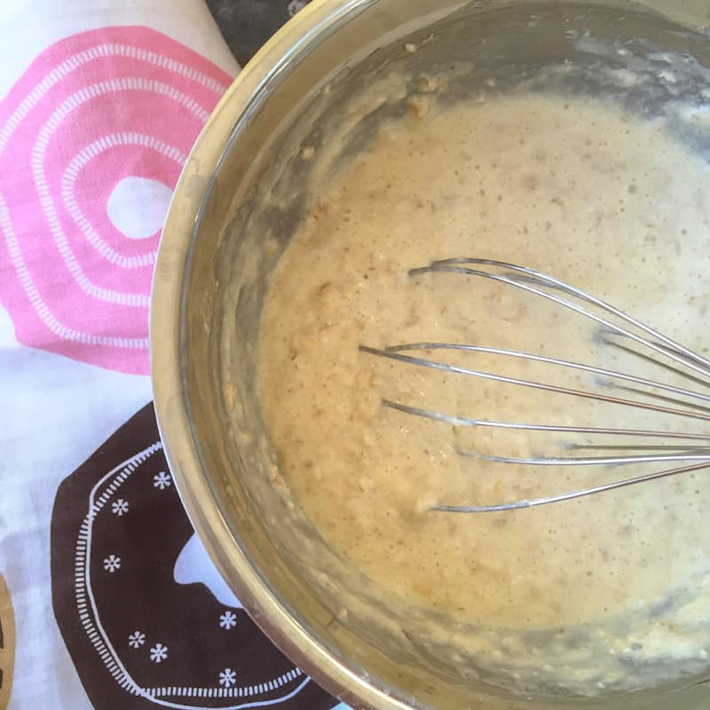 Oatmeal pancake batter with a whisk