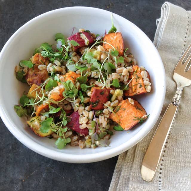 Sweet potato and farro salad in a bowl on the table.