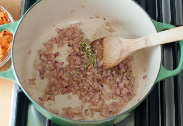 Sautéed onion garlic and cilantro in a pot