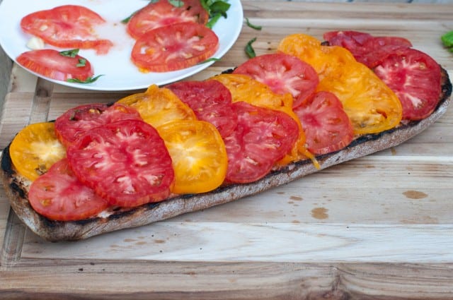 sliced tomatoes on toasted bread