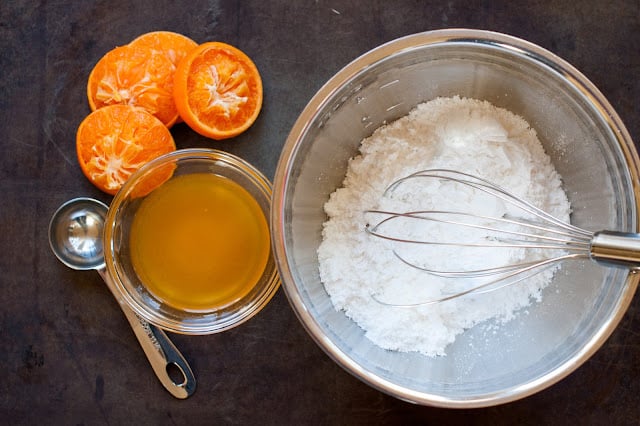 Tangerines and confectioner's sugar