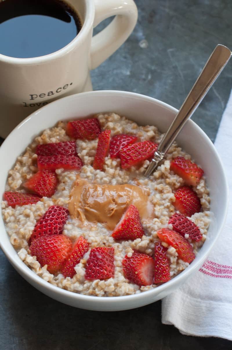 toasted overnight steel cut oats with strawberries and peanut butter