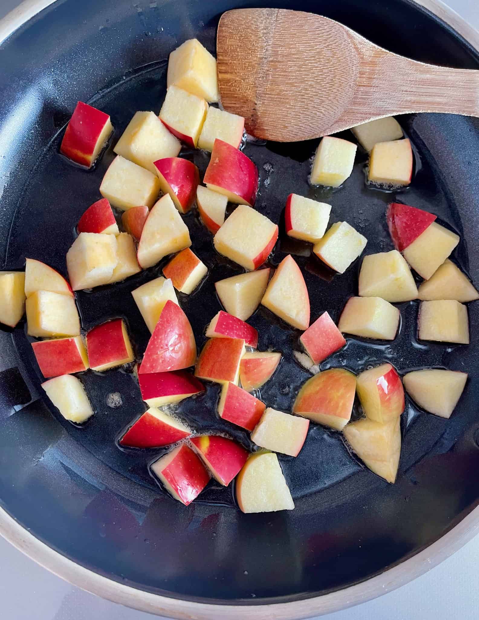 Cut apples in skillet