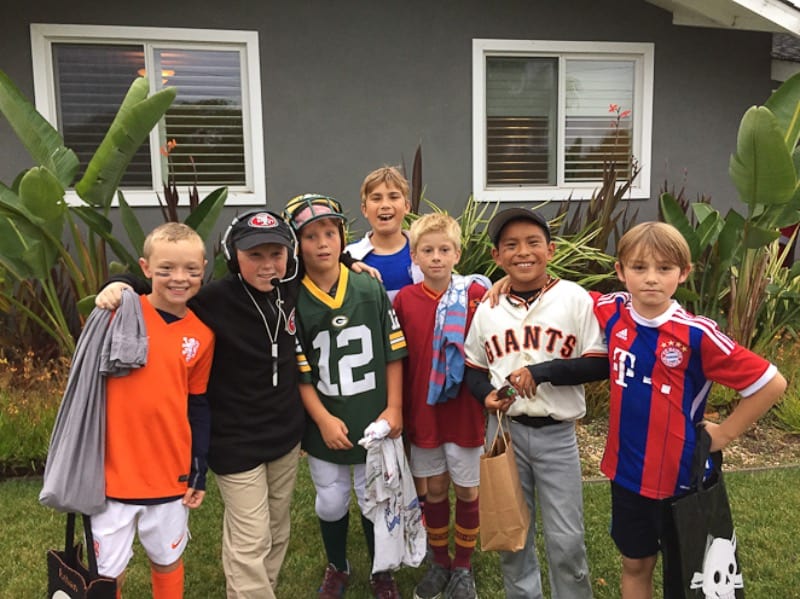 Young boys dressed in sports gear