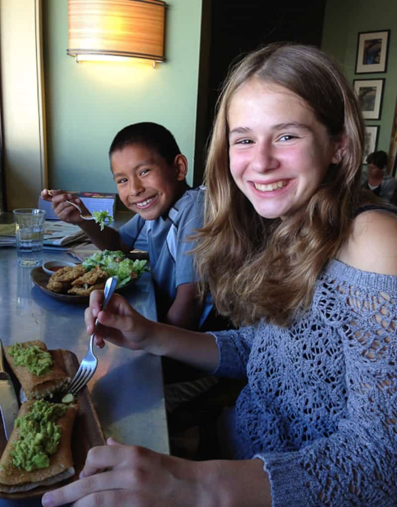 Zoe and Eli dining in restaurant