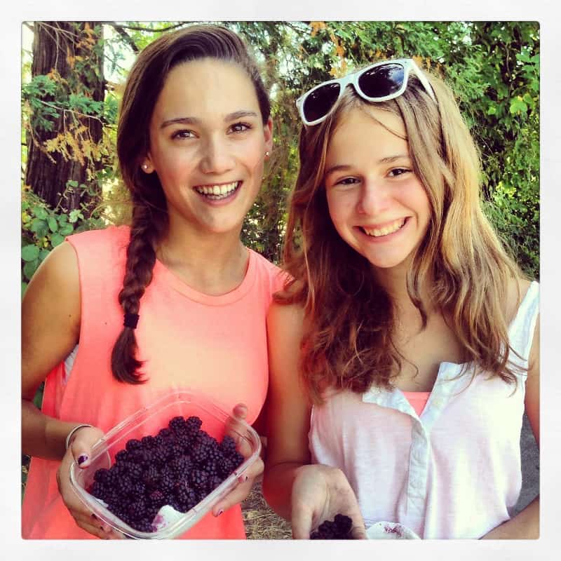 Zoe and friend with blackberries